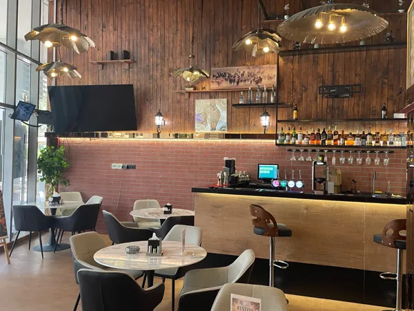 Warm light & welcoming corners · Inside Amwaj