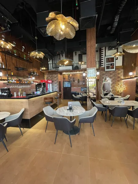 Warm light & welcoming corners · Inside Amwaj