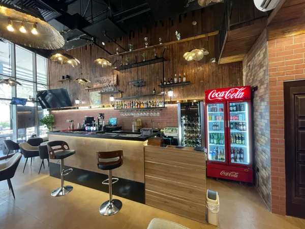 Warm light & welcoming corners · Inside Amwaj